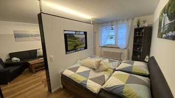 2 habitaciones, tabla de planchar con plancha y cuna de viaje