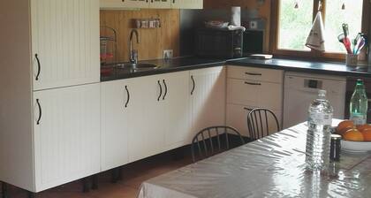 Charming Wooden House with Garden and High-Speed Internet, Near Hiking Trails