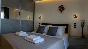 3 chambres, coffres-forts dans les chambres, fer et planche Ă repasser