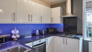 Cottage | Private kitchen | Coffee/tea maker, full-size fridge, oven, stovetop - Tenby Cottage (Whitby)