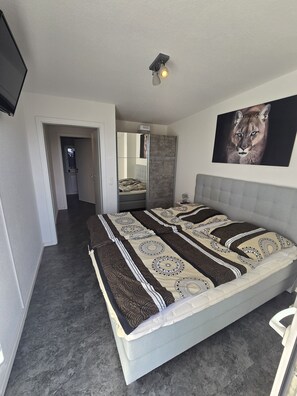 2 bedrooms, travel crib, free WiFi - Modern vacation home Deichkieker with its own sauna (Butjadingen)