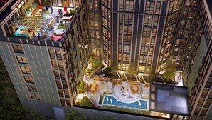 A high-rise building with multiple floors, a rooftop garden, and a swimming pool. - Urban Condo with Balcony in Downtown Ann Arbor (Ann Arbor)