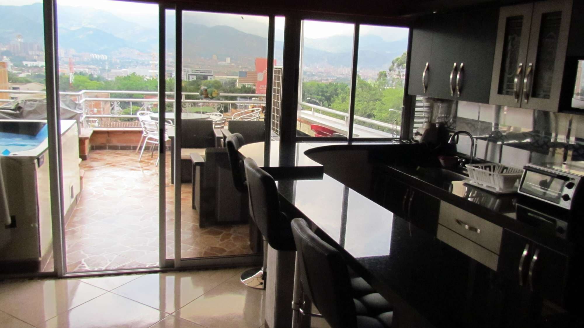 9 bedroom building 5 apartments including the roof Private AC Security 4 blocks Lleras.