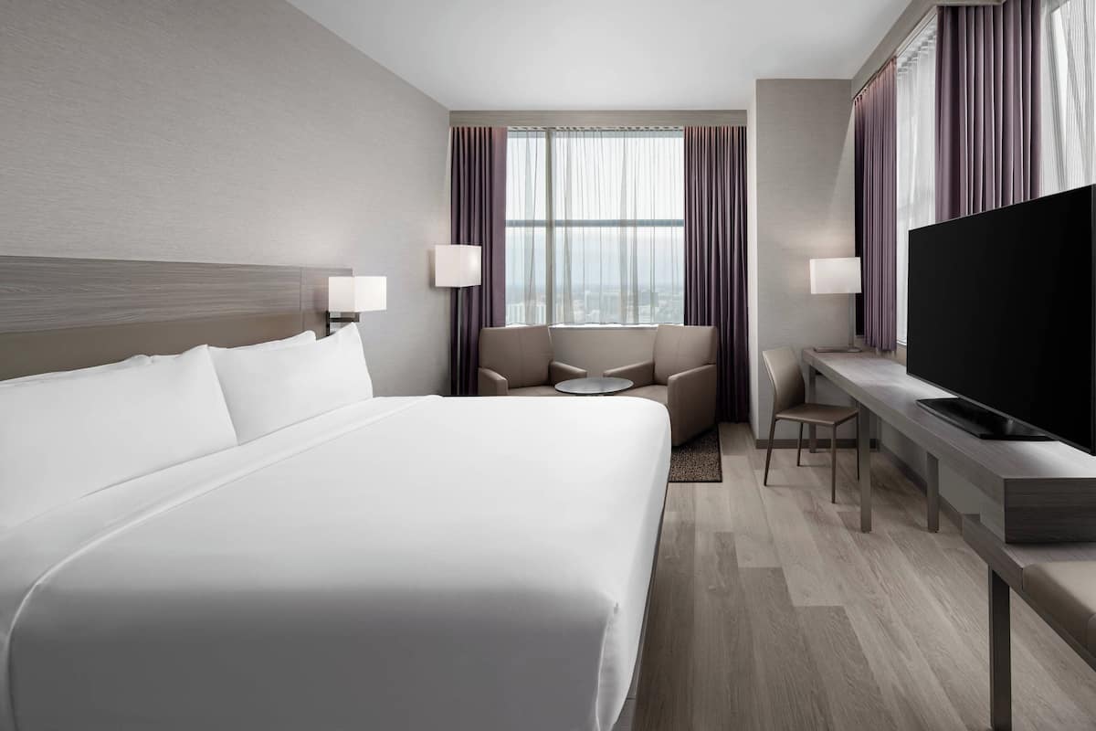 Room, 1 King Bed, Corner | Desk, laptop workspace, iron/ironing board, free cribs/infant beds