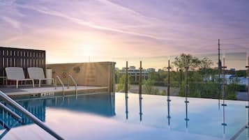 Outdoor pool, pool umbrellas, pool loungers