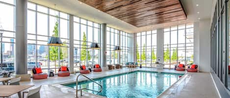 Indoor pool, pool umbrellas, sun loungers