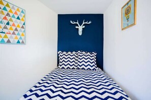 2 bedrooms, desk, iron/ironing board, travel cot