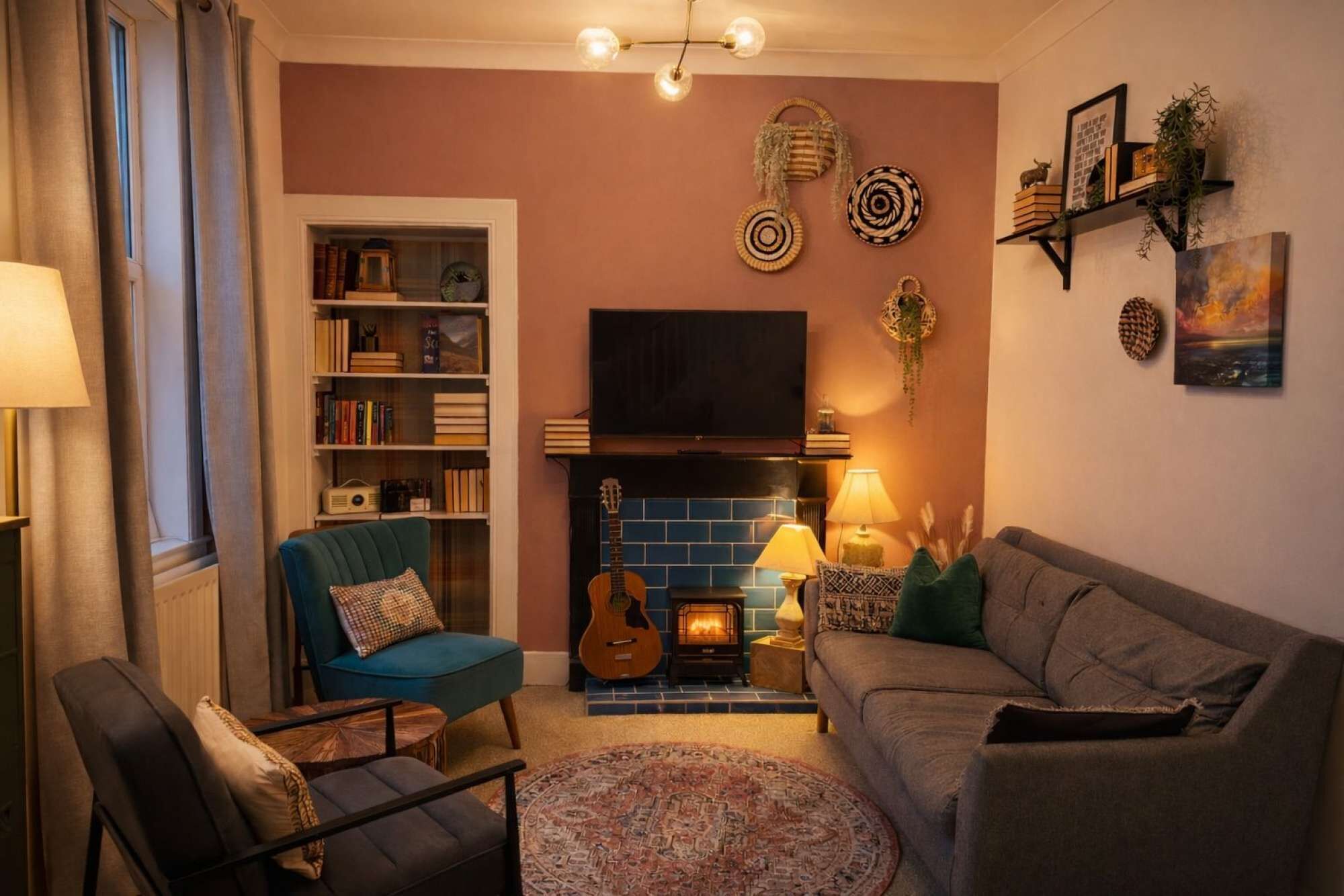 TV, fireplace, books