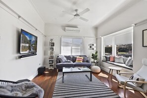 TV, fireplace, books, stereo