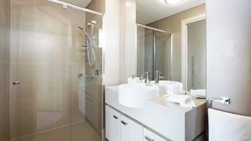 Bathtub, hair dryer, towels