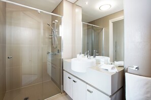 Bathtub, hair dryer, towels