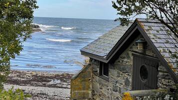 On the beach, sun loungers, beach towels