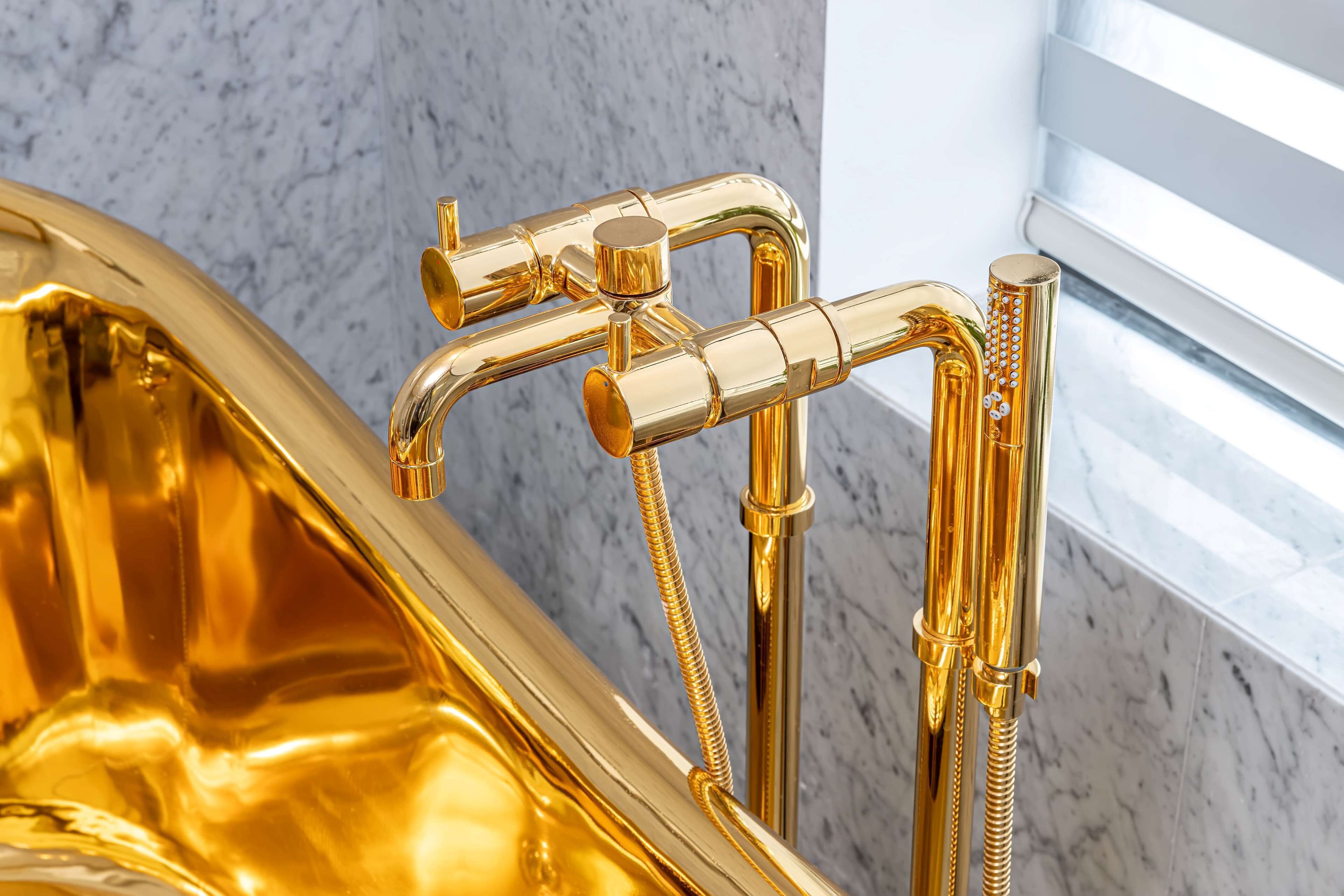 separate bathtub and shower, rainfall showerhead, designer toiletries