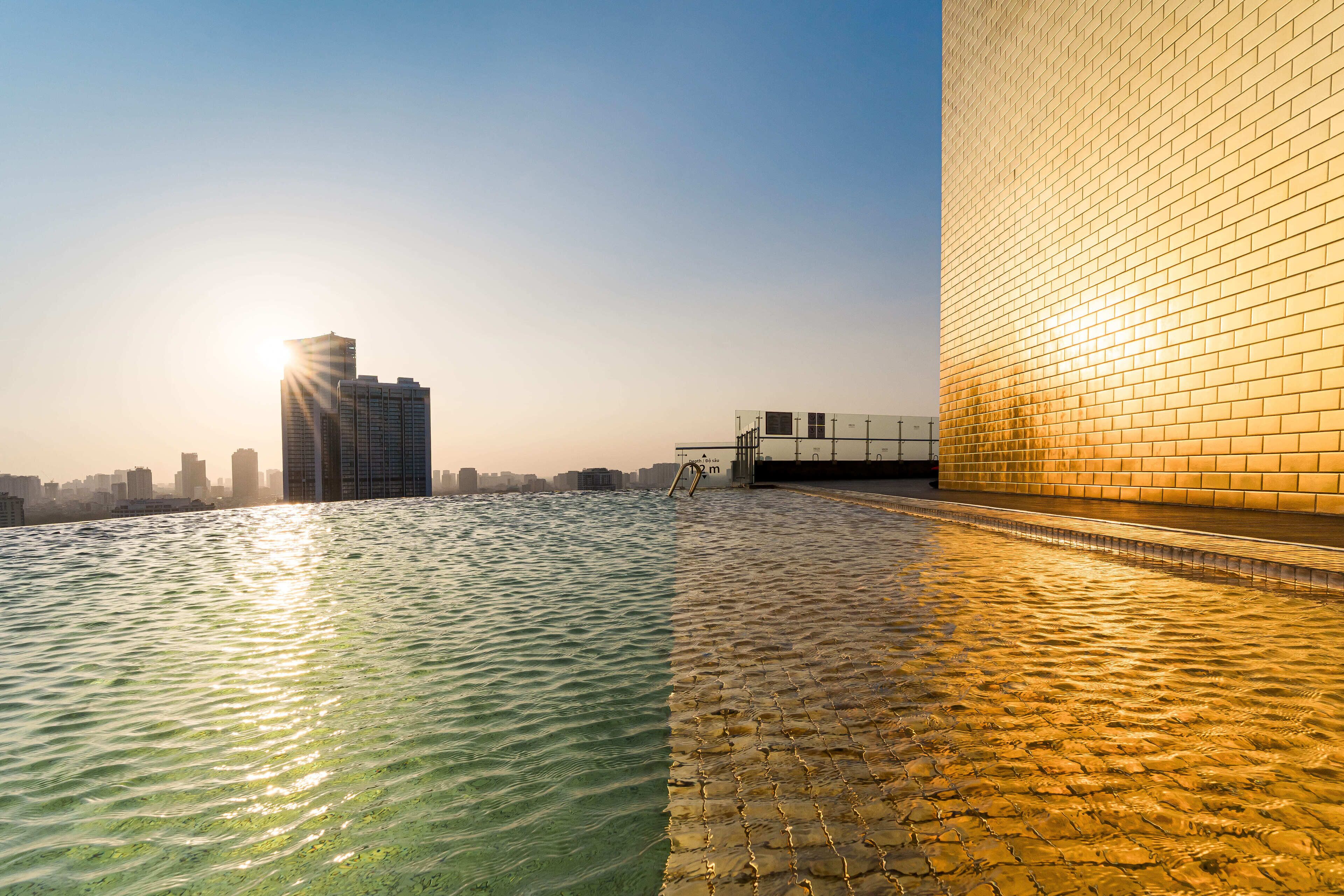 outdoor pool, open 6:00 am to 10:00 pm, pool umbrellas, pool loungers