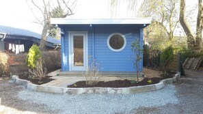 Exterior detail - Pure relaxation right next to the forest and only 750m to the beach in our Retro Chalet No. 3 (Kellenhusen)