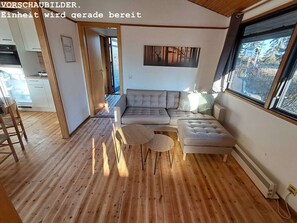Living area - Pure relaxation right next to the forest and only 750m to the beach in our Retro Chalet No. 3 (Kellenhusen)