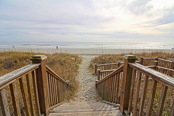 On the beach, sun loungers, beach towels
