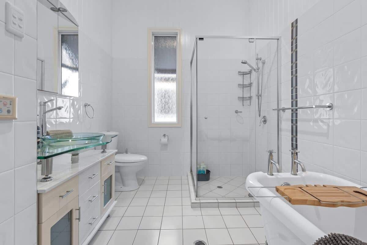 Bathtub, hair dryer, towels, soap