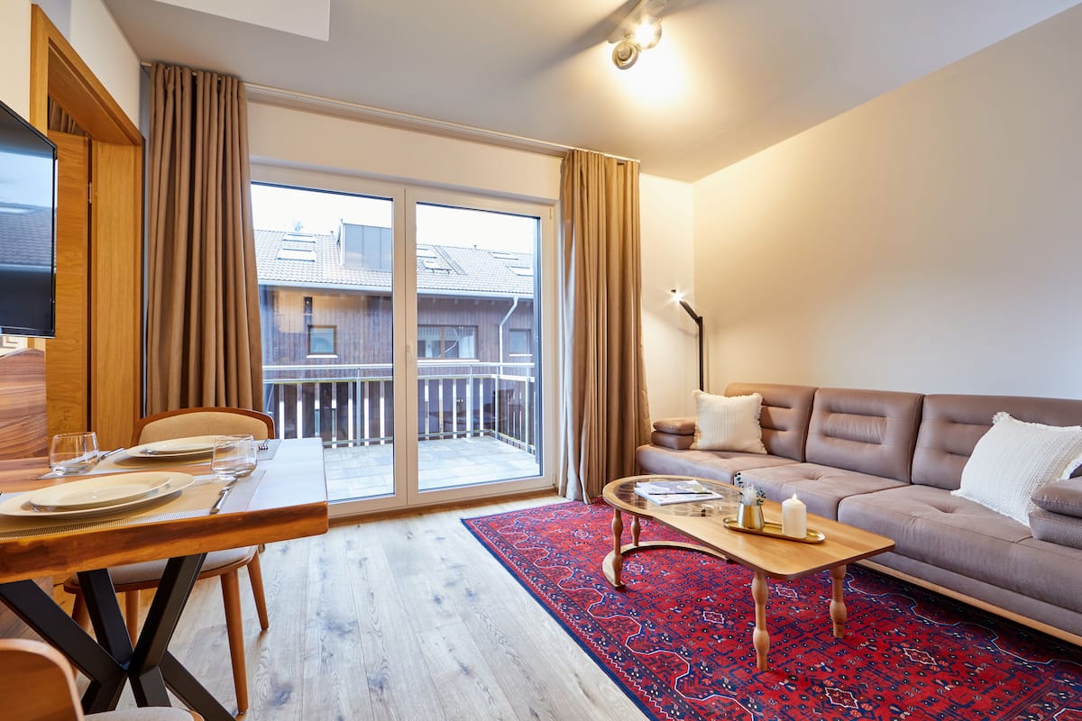 Classic Apartment, 1 Bedroom, Non Smoking | Living area | Flat-screen TV, heated floors