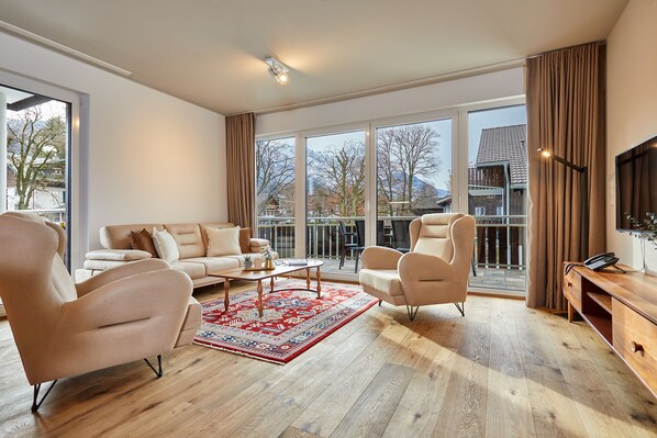 Deluxe Apartment, 2 Bedrooms, Non Smoking, Mountain View | Living area | Flat-screen TV, heated floors