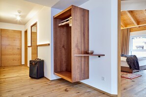 Deluxe Apartment, 2 Bedrooms, Non Smoking, Mountain View | Living area | Flat-screen TV, heated floors - Bader Suites (Garmisch-Partenkirchen)