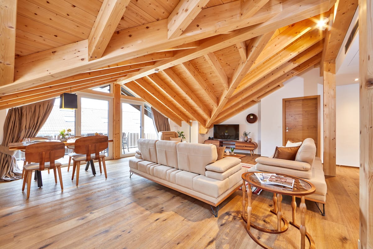 Panoramic Suite, 2 Bedrooms, Non Smoking, Mountain View | Living area | Flat-screen TV, heated floors