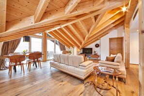Panoramic Suite, 2 Bedrooms, Non Smoking, Mountain View | Living area | Flat-screen TV, heated floors - Bader Suites (Garmisch-Partenkirchen)