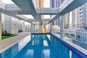 Outdoor pool, a rooftop pool - Regal & Modern 2BR With Study in Downtown Dubai - Sleeps 5! (Dubai)