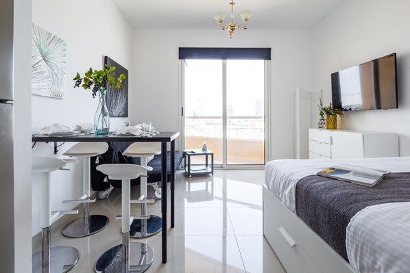 Laptop workspace, iron/ironing board, WiFi, bed sheets