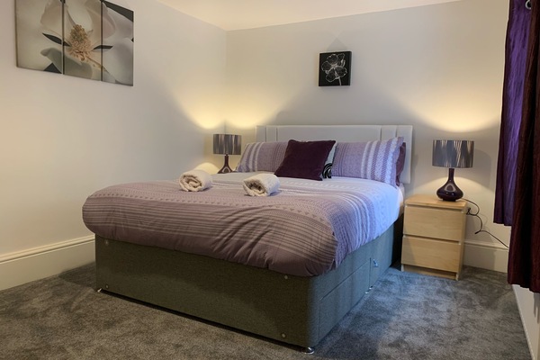 Large bedroom with King size bed on second floor