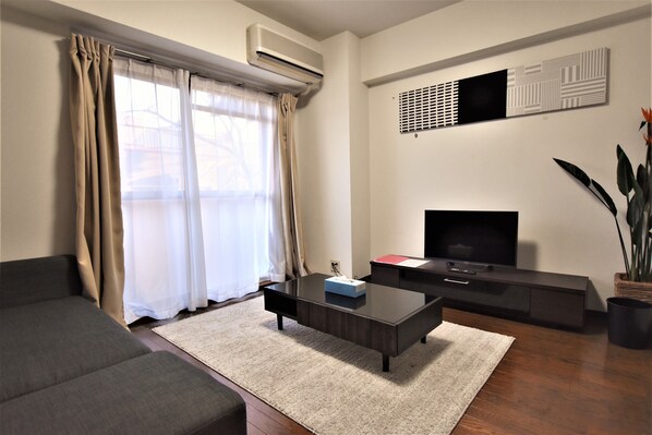 Deluxe Family Suite, Non Smoking (6F, 7F) | Living area | Flat-screen TV