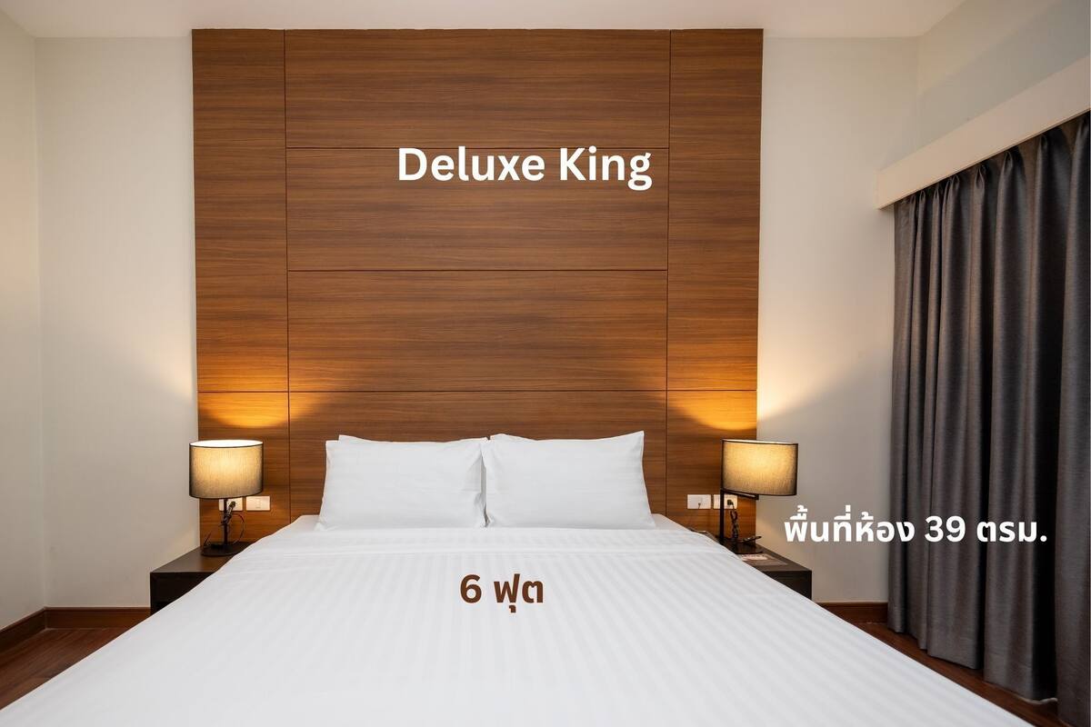 Deluxe Double Room, Garden View | Minibar, in-room safe, desk, soundproofing