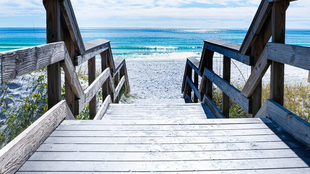 A wooden boardwalk leading to a beach with ocean views. - Seascape Resort Villa - Our Happy Place (Miramar Beach)