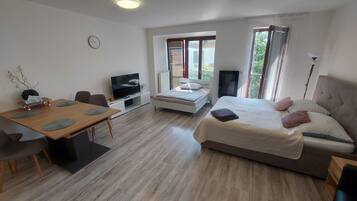 City Apartment, 1 King Bed | 1 bedroom, minibar, desk, laptop workspace