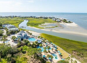 A coastal resort with a large swimming pool, beachfront, and a golf course. - Oceanfront Fripp Villa – Walk to Beach, Pools, Dining – Amenity Cards (Fripp Island)