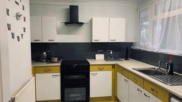 Microwave, coffee/tea maker, cookware/dishes/utensils