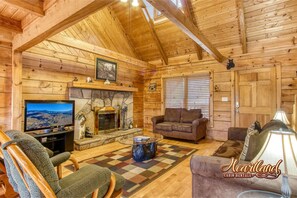 Flat-screen TV, fireplace, video games, DVD player