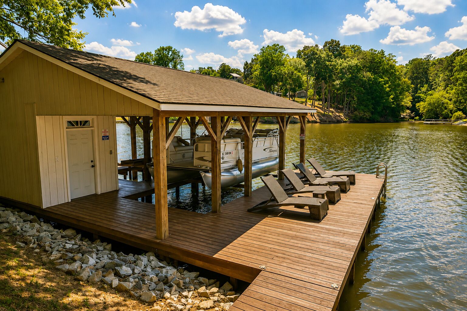 A wooden dock with lounge chairs and a covered seating area by a lake.
