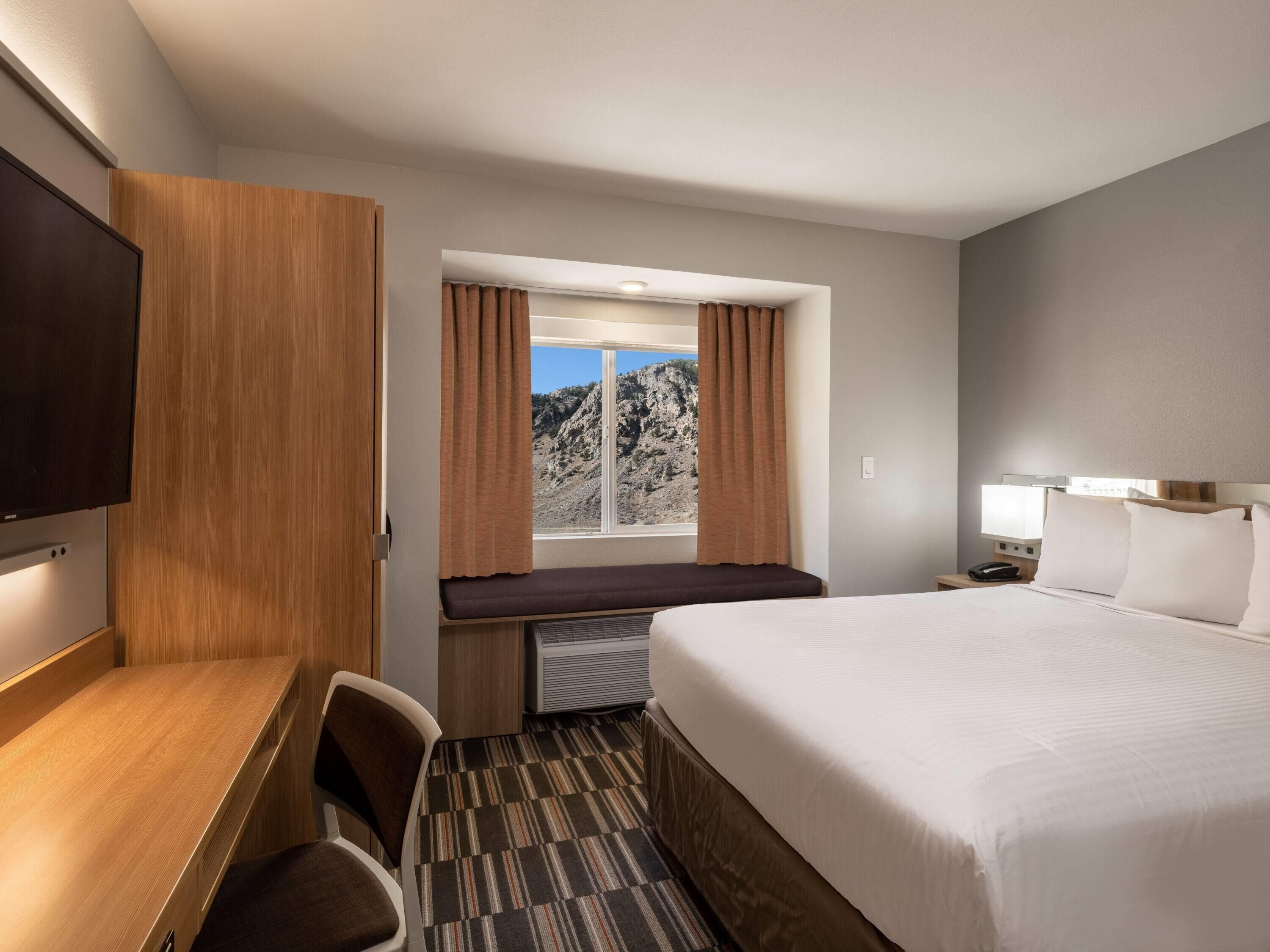 room, 1 queen bed, non smoking | desk, laptop workspace, iron/ironing board, free wifi