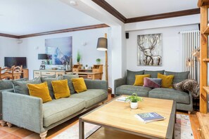 Pothecary apartment has a large living space with 2 seating areas