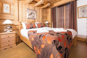 Master bedroom has a king-sized bed & beautiful hand-crafted furniture - Le Kursaal Apartment, Ski/Hike, Chamonix All Year (Chamonix)
