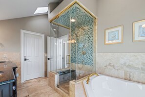 Combined shower/bathtub, jetted bath, hair dryer, towels