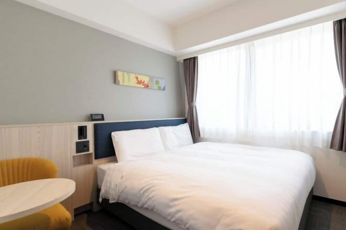 In-room safe, desk, laptop workspace, blackout curtains