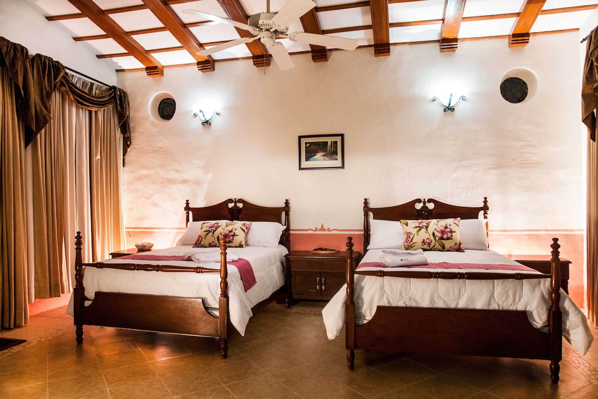 2 bedrooms, down comforters, pillowtop beds, in-room safe