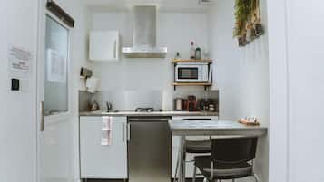 Fridge, microwave, stovetop, coffee/tea maker