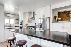 Fridge, microwave, oven, stovetop - An Unmatched Beauty | Immaculate Interior | Rooftop Deck w/ Fireplace | 3-Floors of Perfection (Newport Beach)