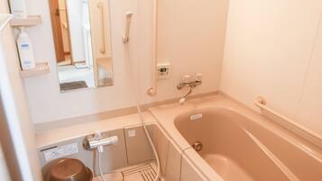Private Vacation Home | Bathroom | Separate tub and shower, hair dryer, slippers, electronic bidet