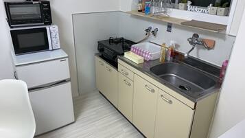 Apartment | Private kitchenette | Fridge, microwave, stovetop, coffee/tea maker