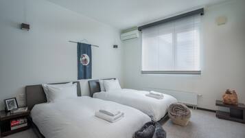 3 Bedroom House, Non smoking | 3 bedrooms, in-room safe, desk, iron/ironing board