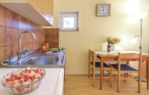 Fridge, stovetop, cookware/dishes/utensils